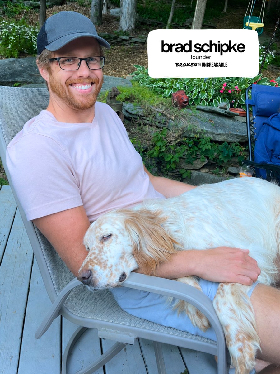 Brad Schipke, founder of Broken To Unbreakable, with his dog